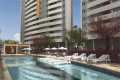 Área de lazer com piscina e churrasqueira