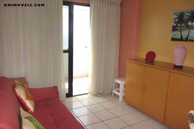 Sala com porta para a varanda