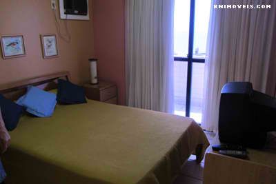 Quarto suite com porta para a varanda