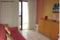 Sala com porta para a varanda